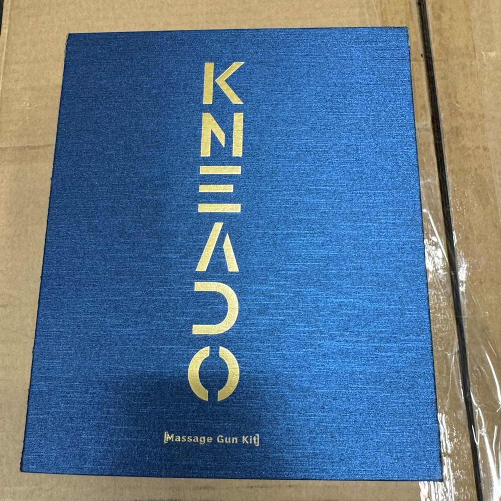 Kneado Massage Gun Kit in Blue and Gold